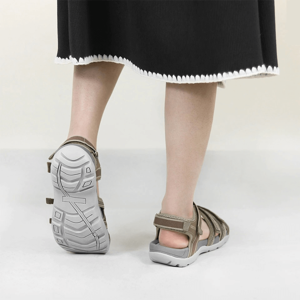 Back view of model wearing Trekking Non-Slip Women's Sandals with Adjustable Hooks, showcasing durable anti-slip design and PU leather.